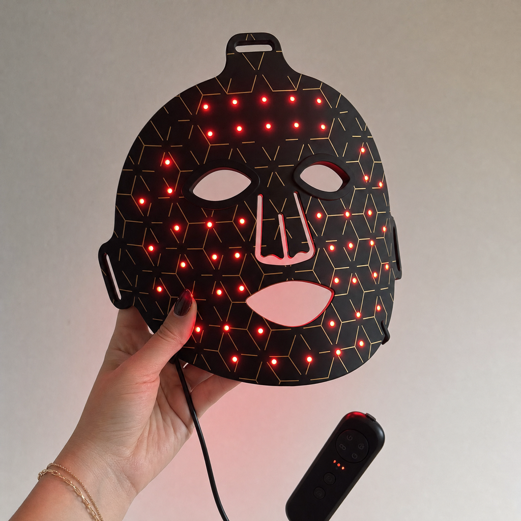 Holding the glowing AXVOVA mask